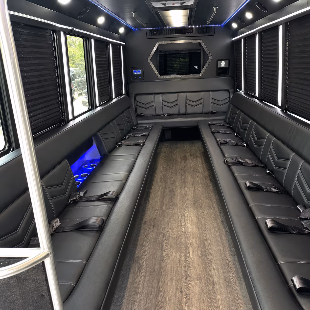 Group beside a Mercedes Sprinter limo in Jacksonville